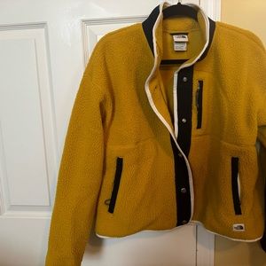 The North Face women’s Cragmont Fleece in mustard/navy size M.